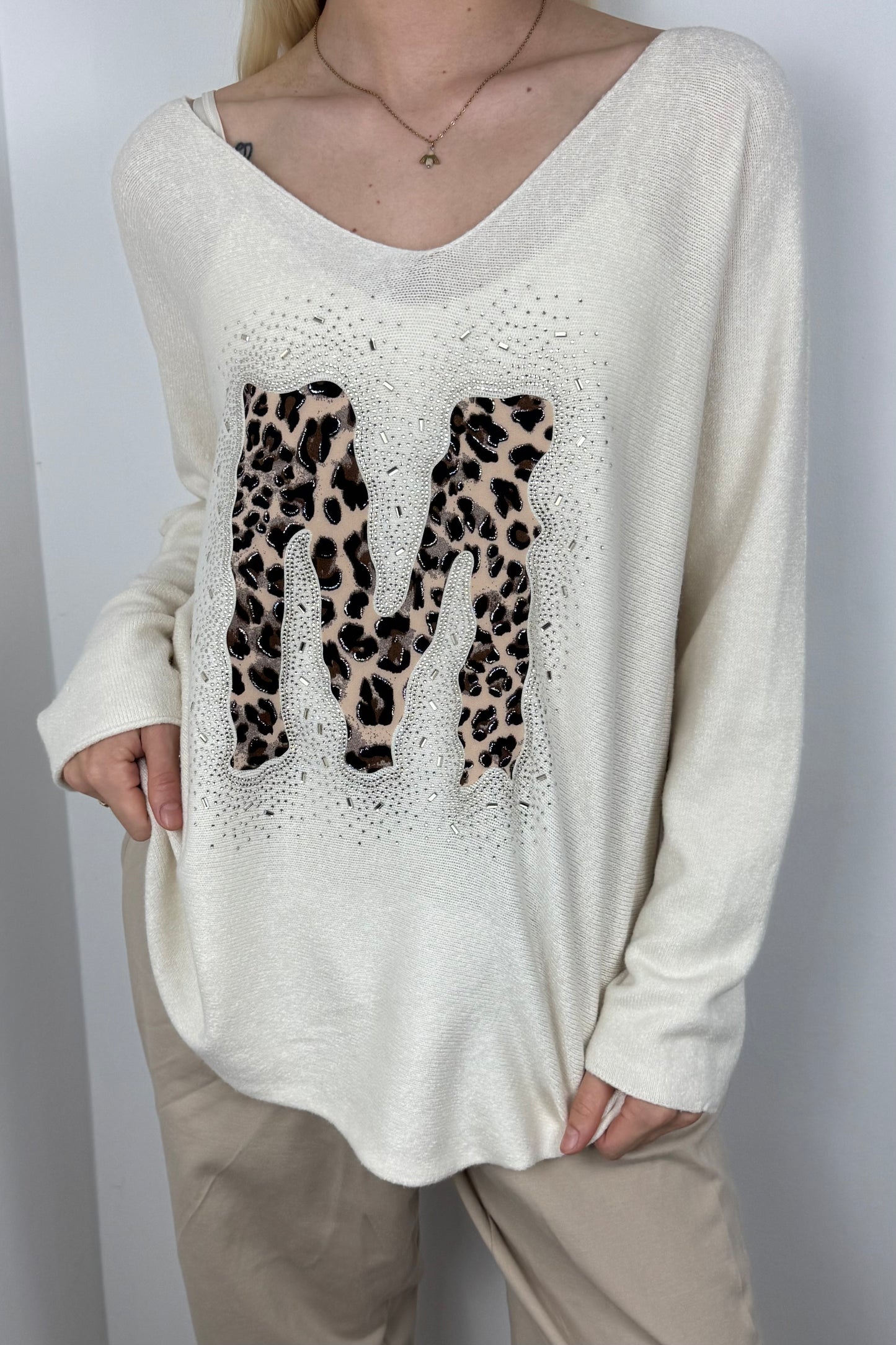 Langarmshirt mit Strass-Detail und M-Applikation-Butter