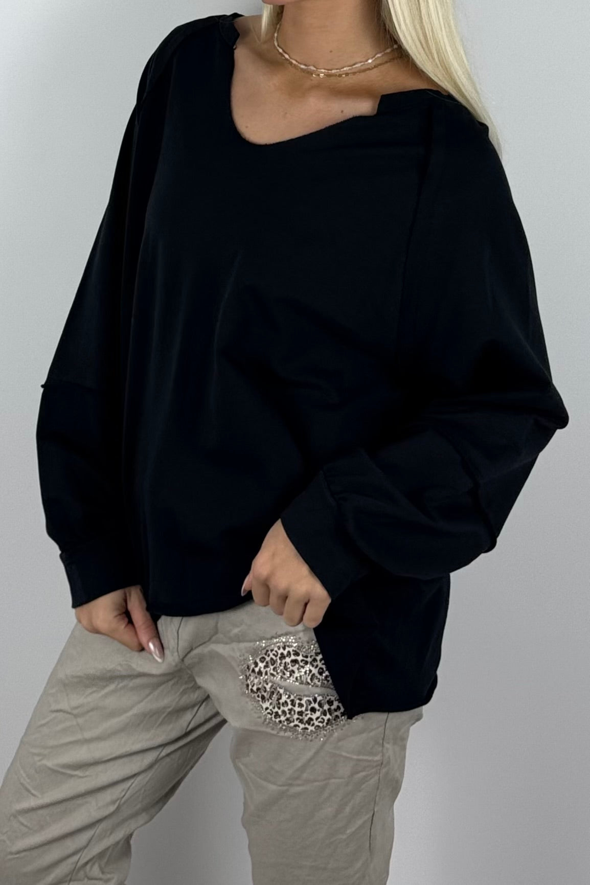 Damen Oversize-Sweatshirt mit V-Ausschnitt-Schwarz