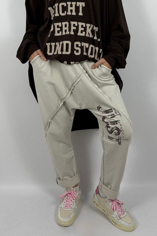 Lässige Baggy-Hose mit „JUST“-Detail – Beige