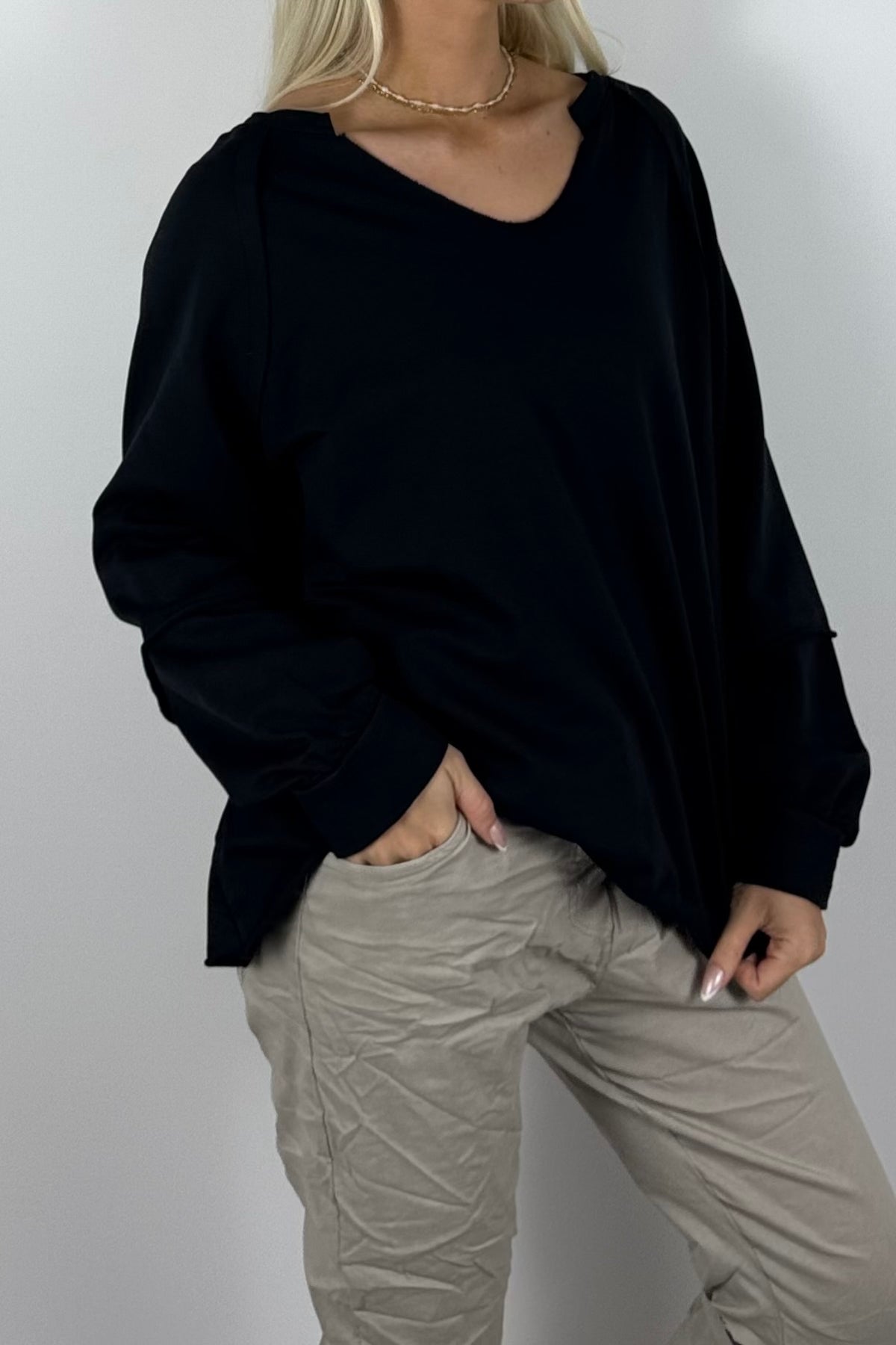 Damen Oversize-Sweatshirt mit V-Ausschnitt-Schwarz