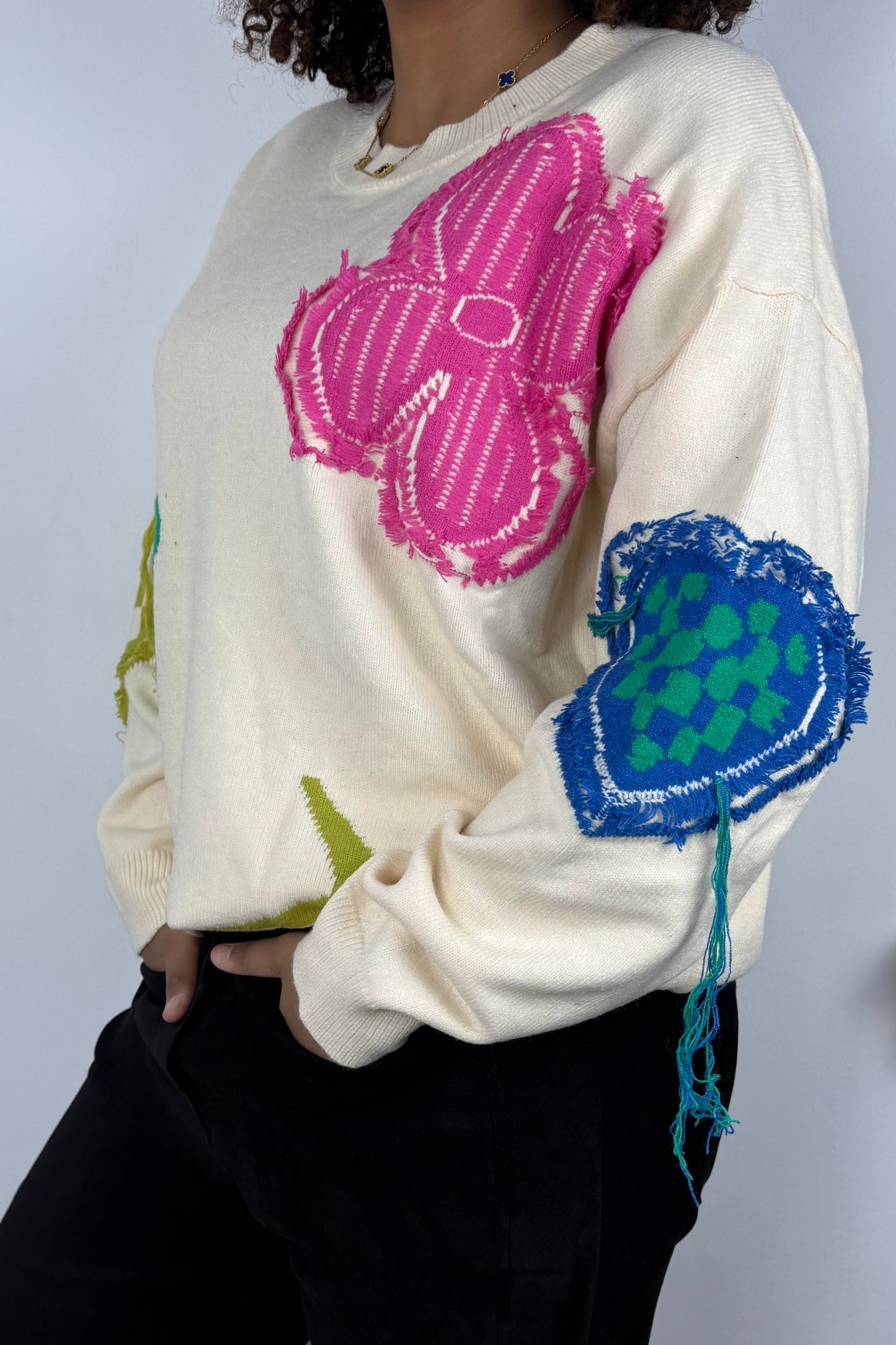 Strickpullover mit bunten Blumen-Details – Beige